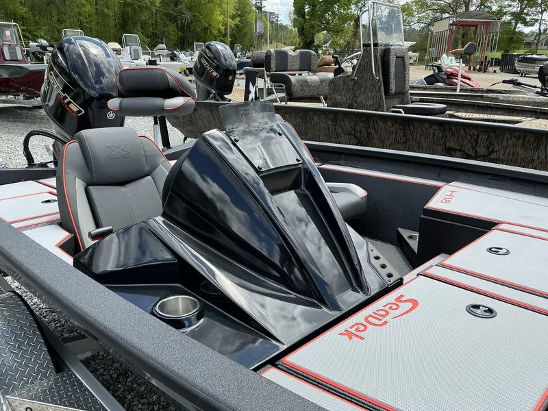 Slide: The Image of 2025 Xpress Hyper-Lift Series H18 bass boat with sleek design and comfortable seating. - 3