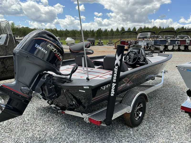 Slide: The Image of 2025 Xpress Hyper-Lift Series H18 bass boat with Yamaha engine on trailer. - 6
