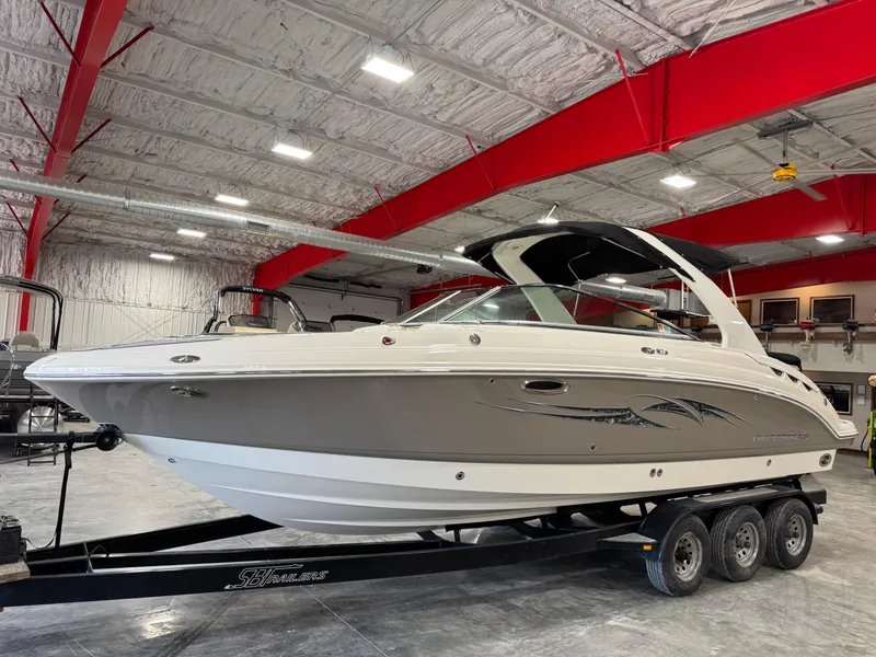 Slide: The Image of 2007 Chaparral 276 SSX boat on trailer in indoor storage facility. - 1