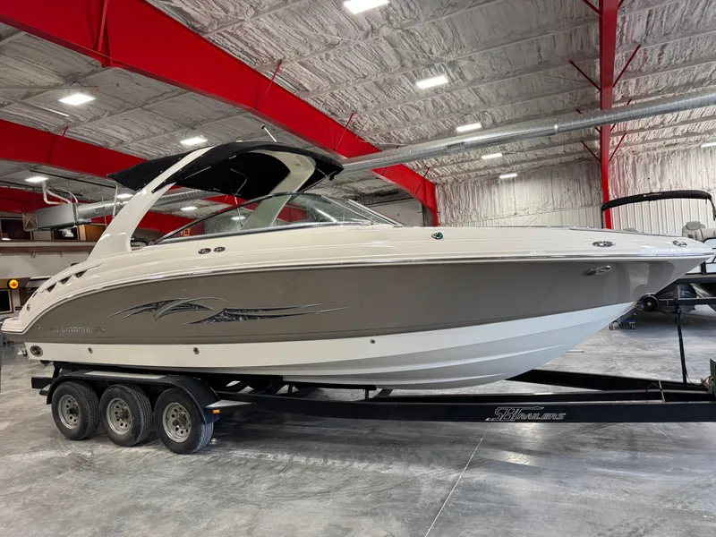 Slide: The Image of 2007 Chaparral 276 SSX boat on trailer in indoor storage facility. - 2