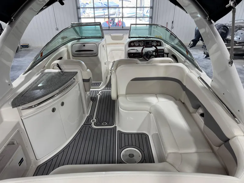 Slide: The Image of 2007 Chaparral 276 SSX boat interior with sleek seating and modern dashboard. - 6