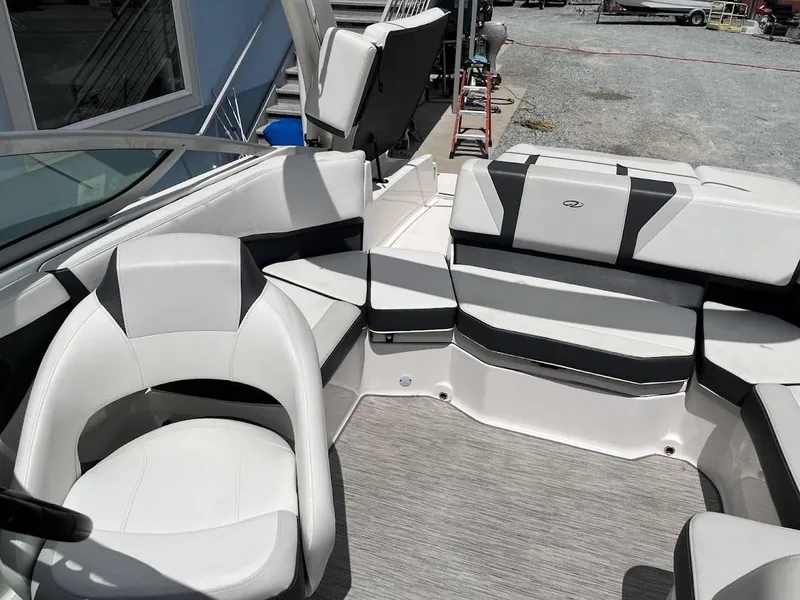 Slide: The Image of Interior of 2016 Regal 2000 ESX boat with white and black seating. - 14