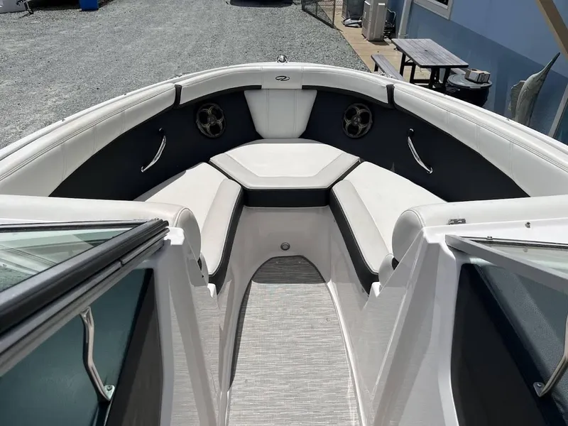 Slide: The Image of 2016 Regal 2000 ESX boat interior with white seating and modern design. - 3