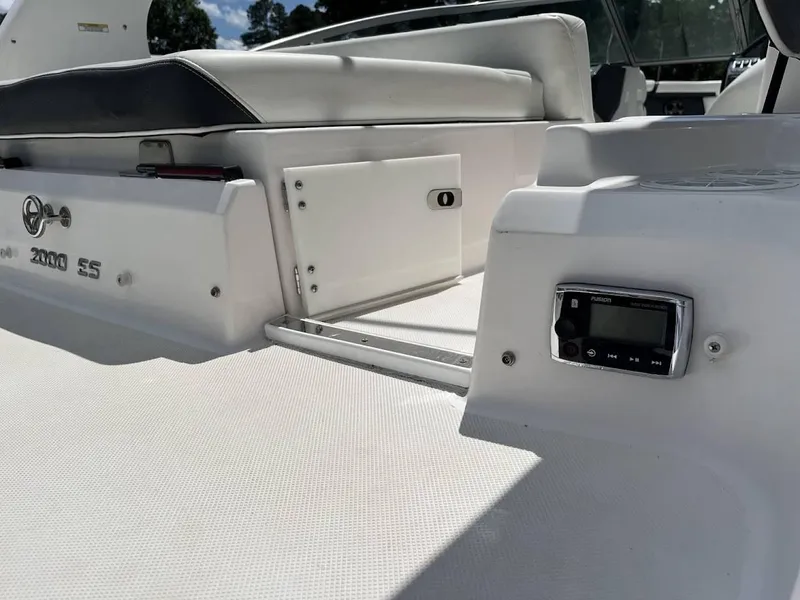 Slide: The Image of 2016 Regal 2000 ESX boat interior with seating and audio controls. - 9