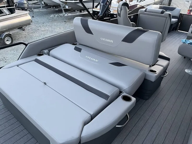 Slide: The Image of 2022 Sylvan L3 DLZ pontoon boat with gray seating and cup holders. - 11