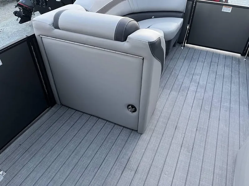 Slide: The Image of 2022 Sylvan L3 DLZ boat interior with gray seating and flooring. - 15