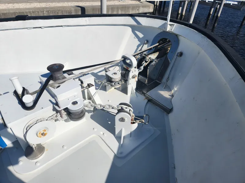 Slide: The Image of Anchor winch system on a 1983 Custom 76 Trawler boat deck. - 25