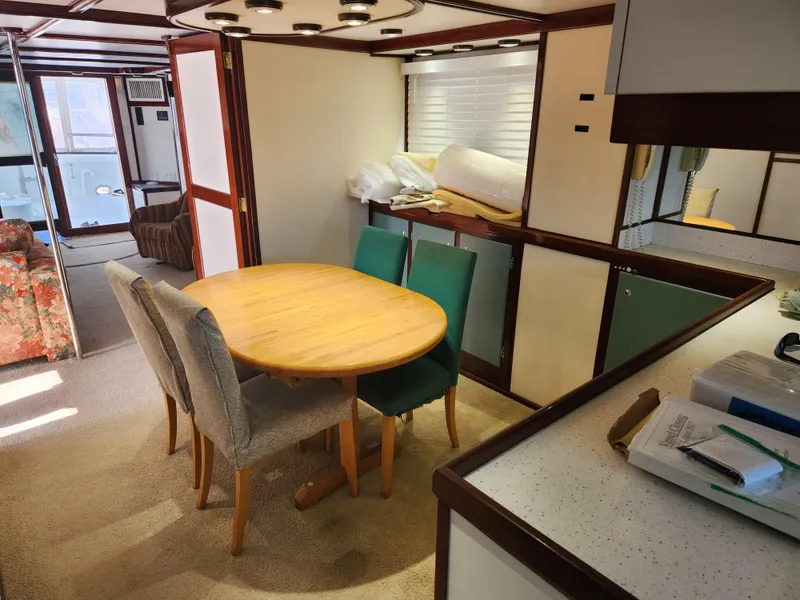 Slide: The Image of Interior of 1983 Custom 76 Trawler with dining area and modern furnishings. - 39