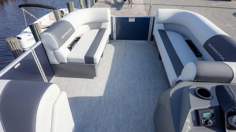 Slide: The Image of 2025 Bennington 20 SL pontoon boat interior with gray seating and modern design. - 8