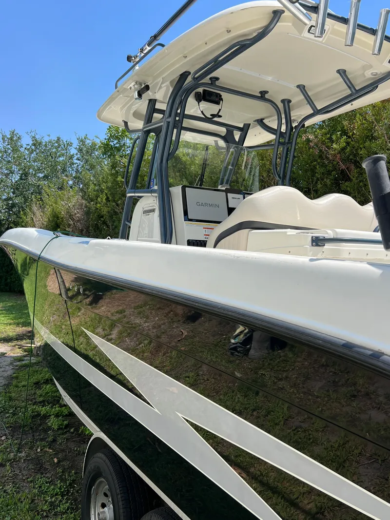 Slide: The Image of 2012 Hydra-Sports 3400 CC boat with sleek design and modern features. - 11