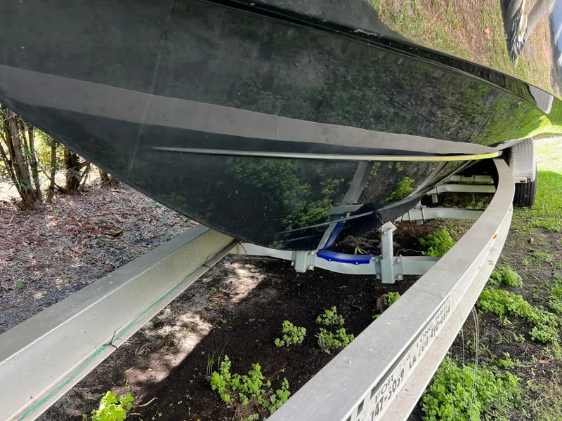 Slide: The Image of 2012 Hydra-Sports 3400 CC boat on trailer, side view, outdoors. - 18