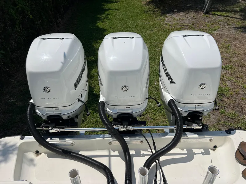 Slide: The Image of Triple Mercury outboard engines on a 2012 Hydra-Sports 3400 CC boat. - 20