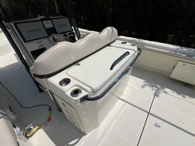 Slide: The Image of 2012 Hydra-Sports 3400 CC boat interior with Garmin navigation system and seating. - 27