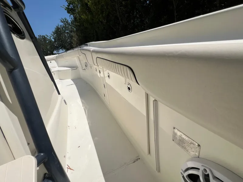 Slide: The Image of 2012 Hydra-Sports 3400 CC boat interior, showcasing sleek design and spacious layout. - 29