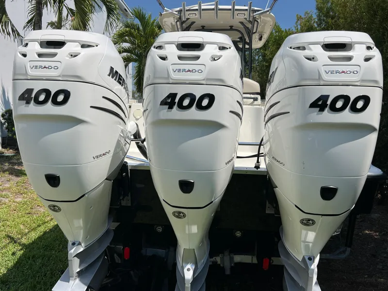 Slide: The Image of Triple Mercury Verado 400 engines on a 2012 Hydra-Sports 3400 CC boat. - 3
