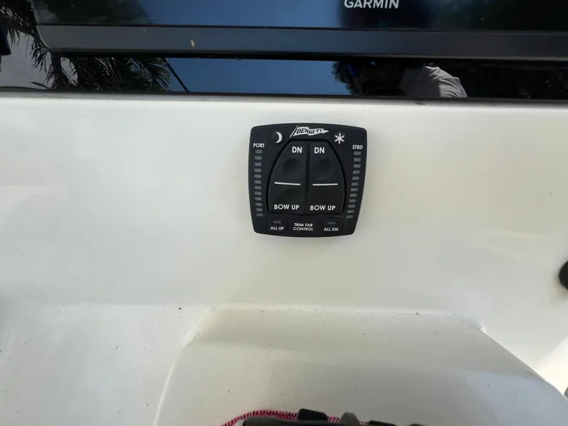 Slide: The Image of 2012 Hydra-Sports 3400 CC boat control panel with Garmin display. - 32