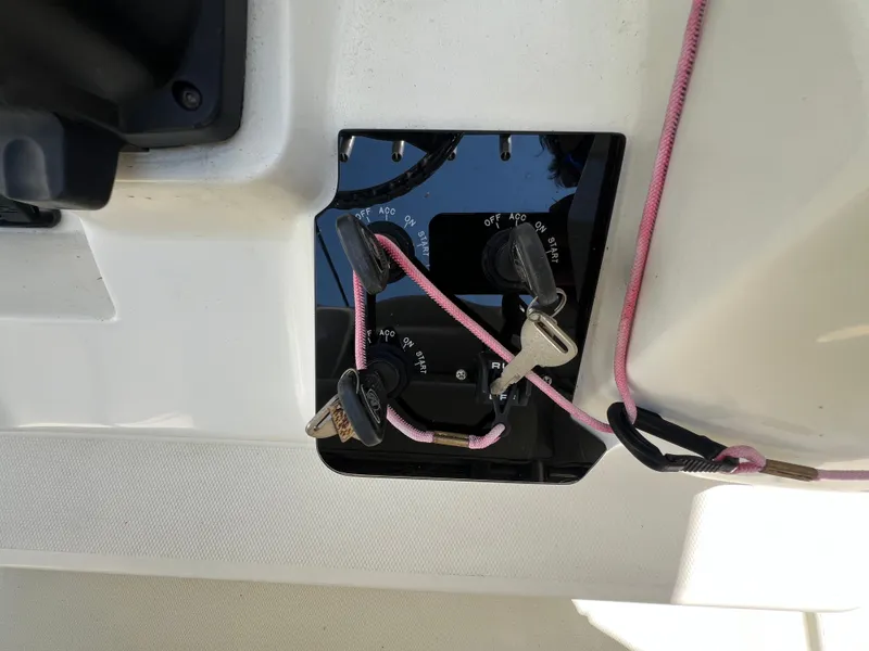 Slide: The Image of Control panel with keys for 2012 Hydra-Sports 3400 CC boat. - 33