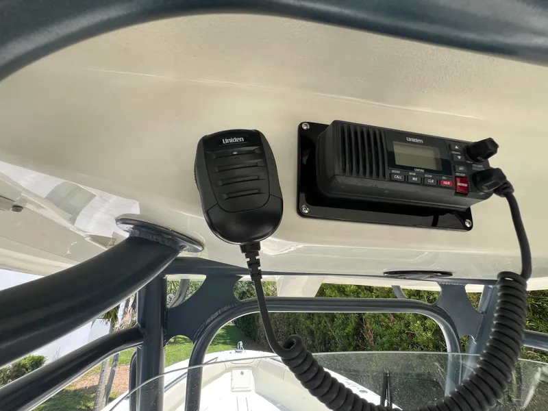 Slide: The Image of 2012 Hydra-Sports 3400 CC boat with mounted Uniden marine radio and microphone. - 41