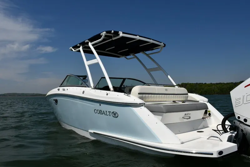 Slide: The Image of 2019 Cobalt 25SC boat on water, featuring sleek design and spacious seating. - 3
