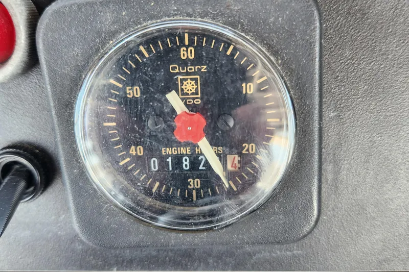 Slide: The Image of Close-up of a 1995 Jefferson 48 Rivanna engine hour meter showing 1824 hours. - 36