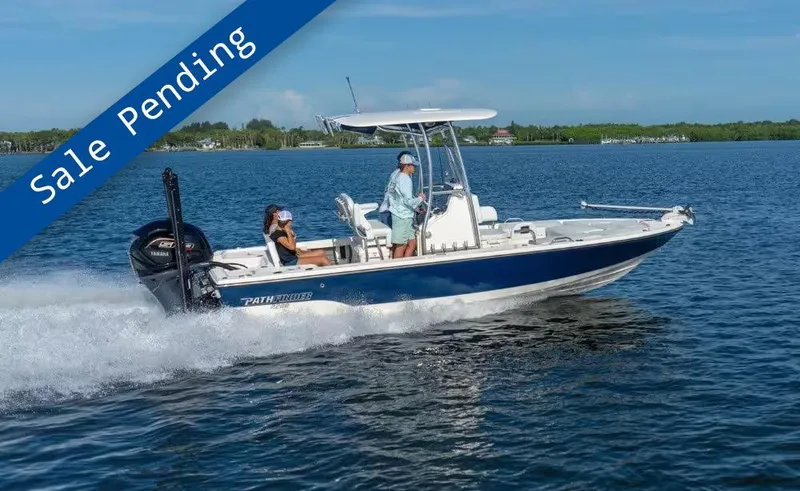 Slide: The Image of 2025 Pathfinder 2200 TRS boat on water, sale pending banner displayed. - 1