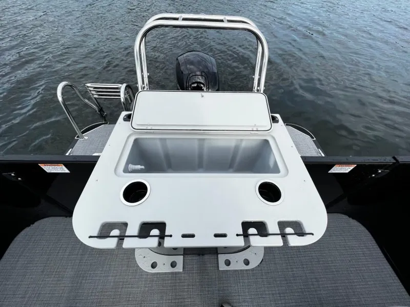 Slide: The Image of 2025 Sylvan Mirage X3 Party Fish boat with fishing station and sink on water. - 16