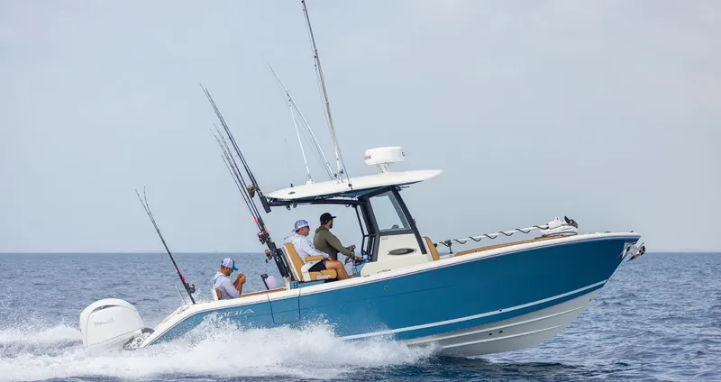 Slide: The Image of Cobia 265 Open Center Console 2026 - 2