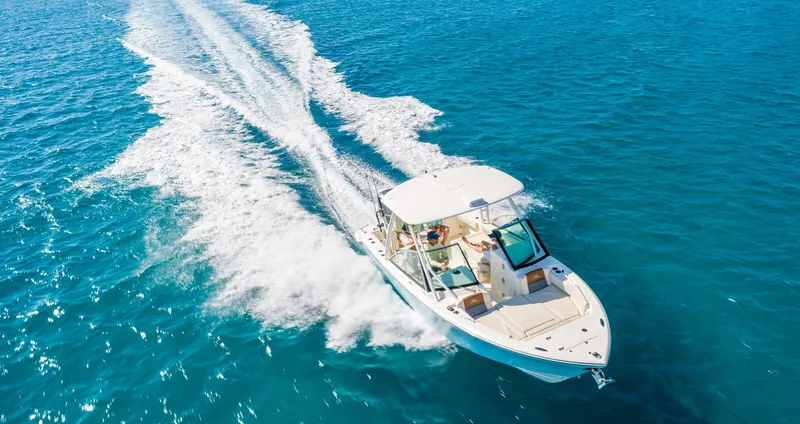 Slide: The Image of Cobia 240 Dual Console 2026 - 2