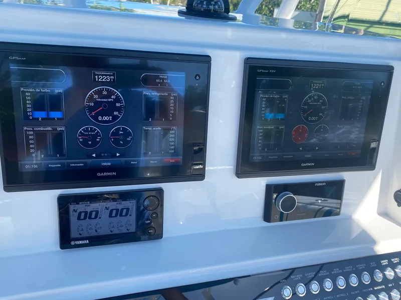 Slide: The Image of Control panel of a 2019 Sea Tech 33 boat with Garmin displays. - 6