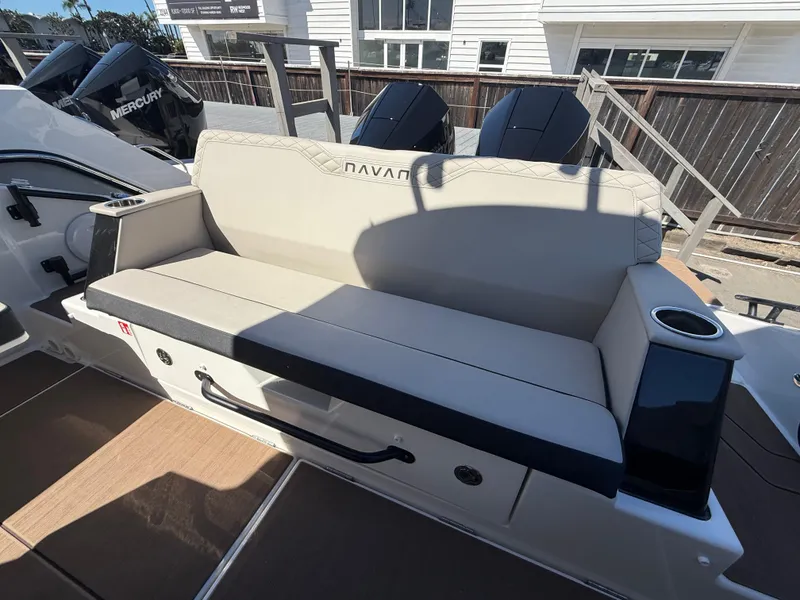 Slide: The Image of 2025 Navan C30 boat seating with cup holders and sleek design. - 12