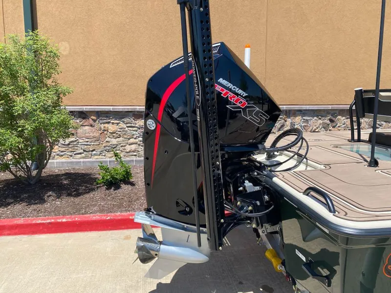 Slide: The Image of 2025 Mako 18 Pro Skiff Backwater Edition with Mercury Pro XS outboard motor. - 8