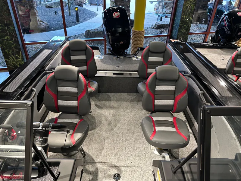 Slide: The Image of 2024 Ranger VX1788 WT boat interior with four gray and red seats. - 3