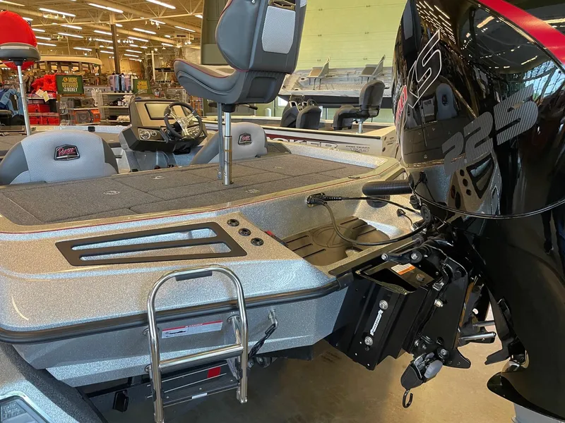 Slide: The Image of 2024 Ranger Z519 Garmin Ranger Cup Equipped boat with motor and seating in showroom. - 5