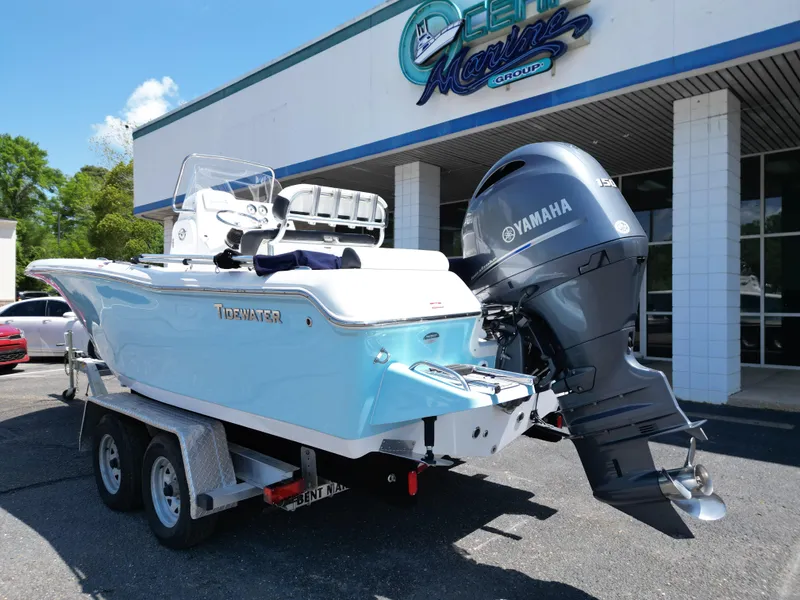 Slide: The Image of 2023 Tidewater 198CC boat with Yamaha engine on trailer outside dealership. - 14