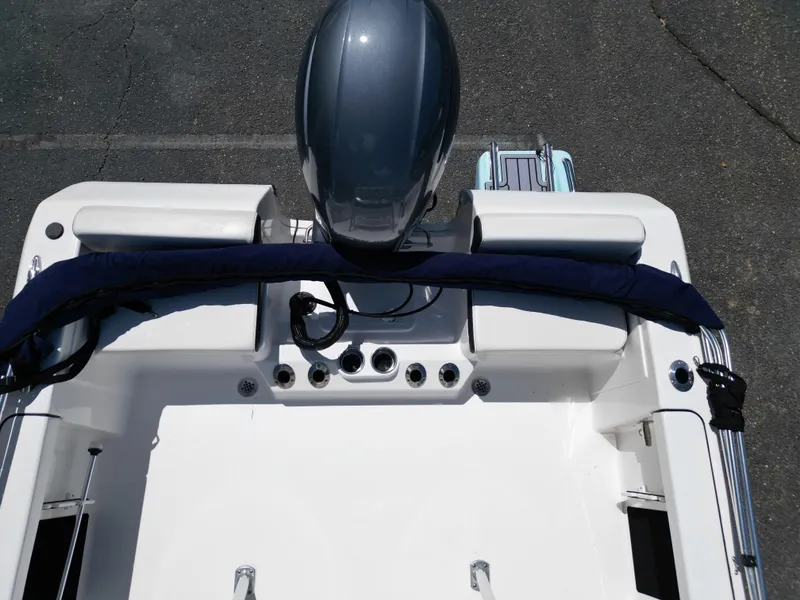 Slide: The Image of 2023 Tidewater 198CC boat, top view of engine and seating area. - 21