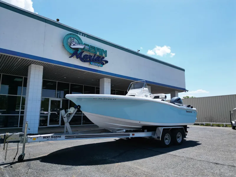 Slide: The Image of 2023 Tidewater 198CC boat on trailer outside Ocean Marine Group building. - 22
