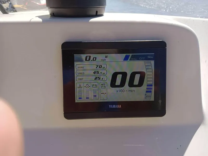 Slide: The Image of Yamaha display on 2021 Cobia 220 Dual Console showing speed and fuel data. - 3