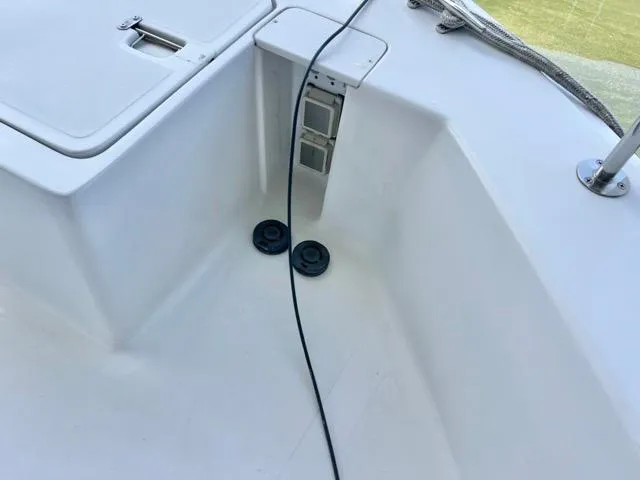 Slide: The Image of 2002 Mainship 390 Trawler deck with cable and fittings. - 48