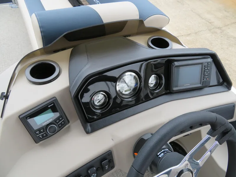 Slide: The Image of Dashboard of 2025 Bennington 22SSB boat with gauges, steering wheel, and controls. - 19
