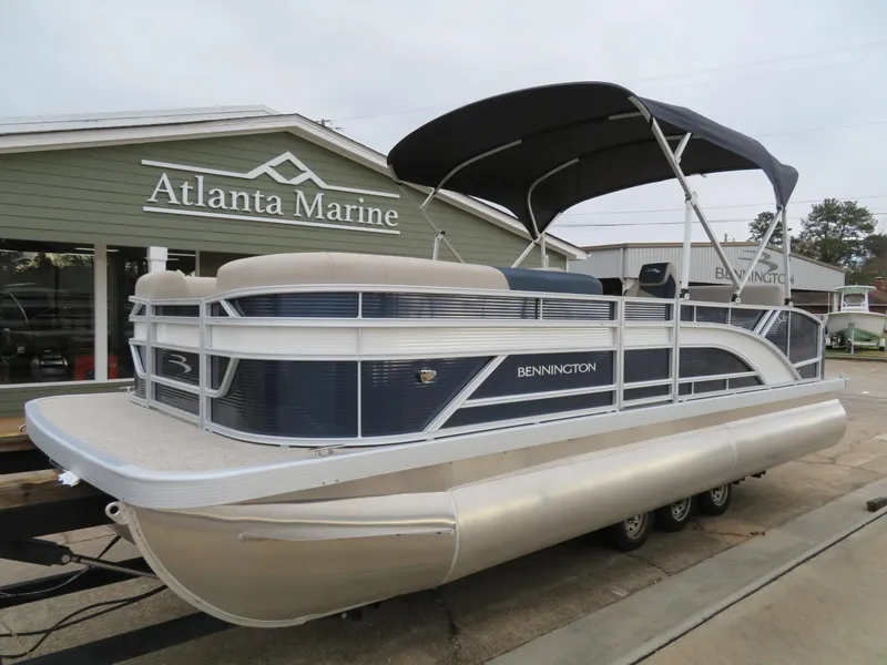 Slide: The Image of 2025 Bennington 22SSB pontoon boat at Atlanta Marine dealership. - 2