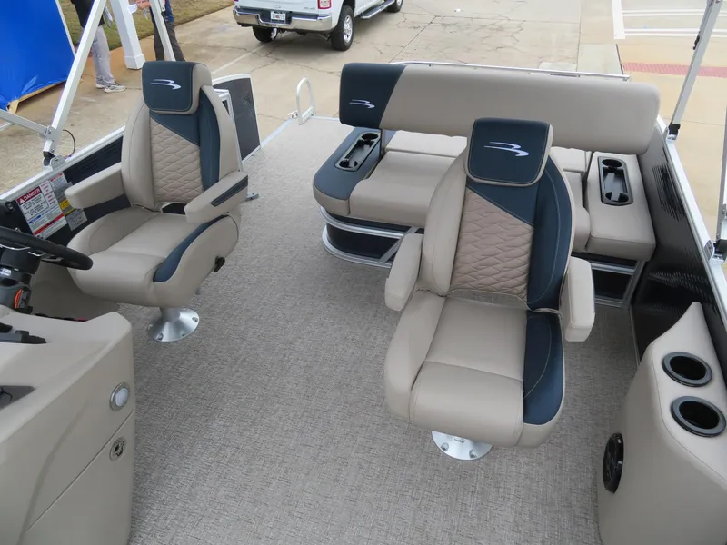 Slide: The Image of 2025 Bennington 22SSB boat interior with plush seating and modern design. - 9