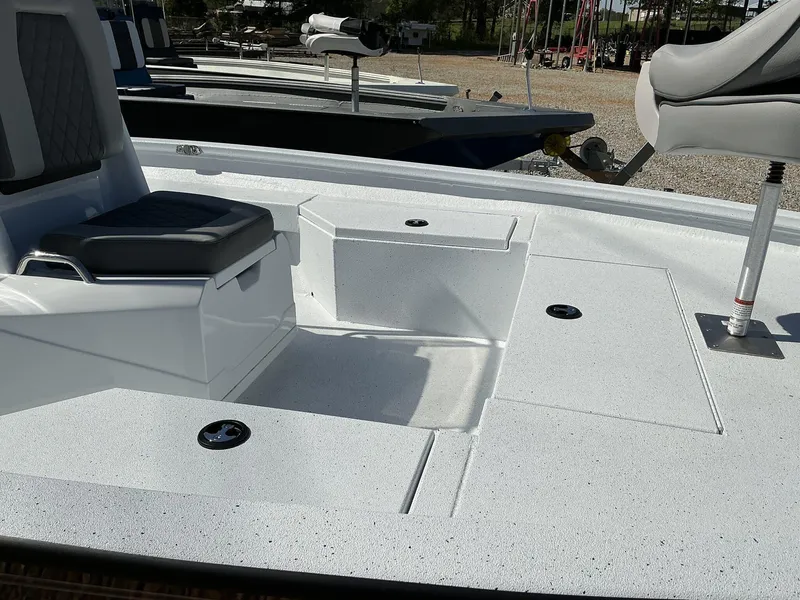 Slide: The Image of 2025 Xpress Hyper-Lift Series H20B boat console with seating and storage compartments. - 4