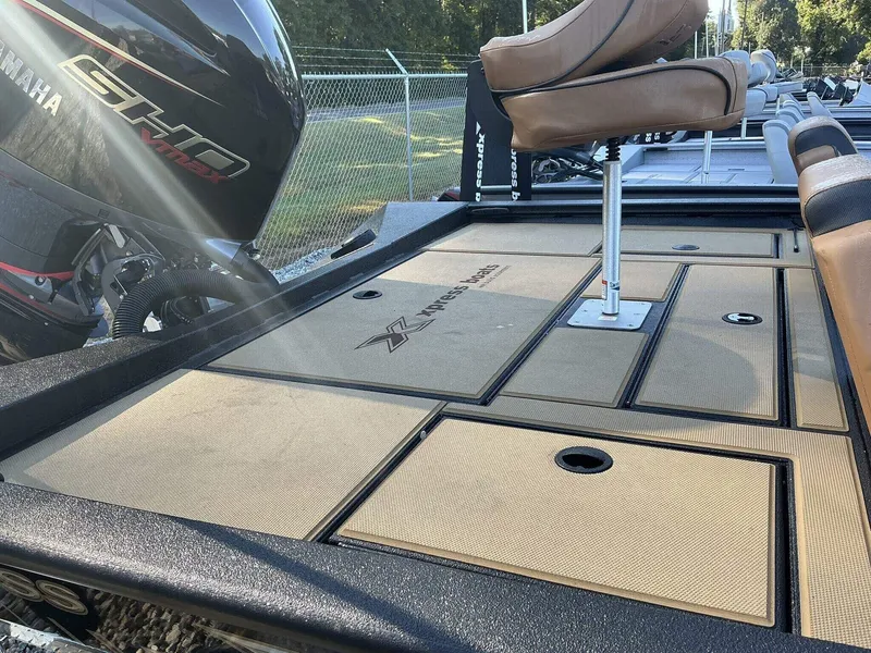 Slide: The Image of 2025 Xpress Hyper-Lift Series H20 BASS boat deck with Yamaha engine. - 5