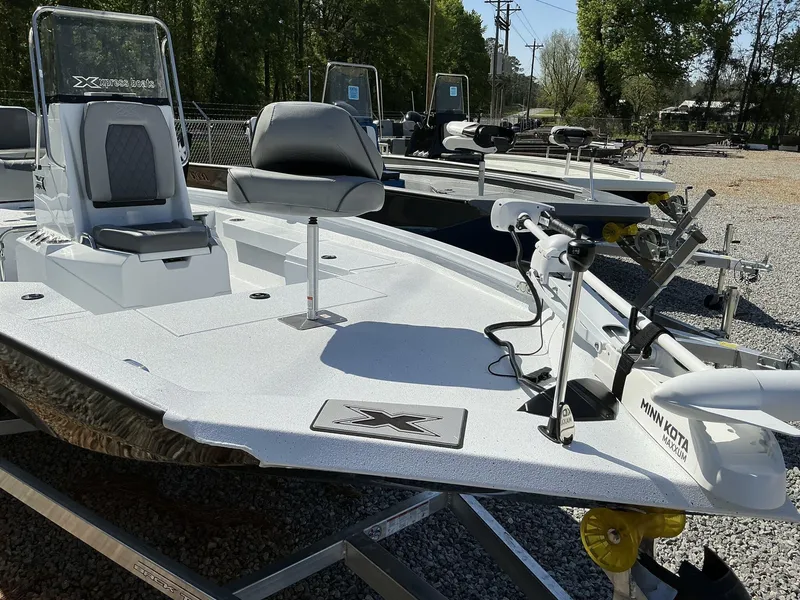 Slide: The Image of 2025 Xpress Hyper-Lift Series H20B boat with new console, displayed outdoors. - 6