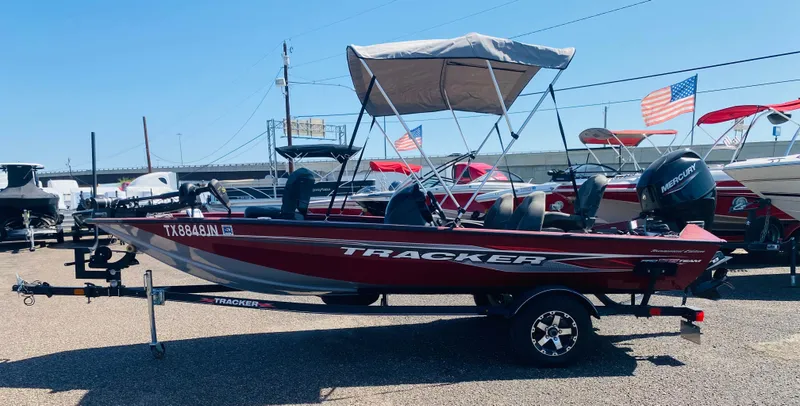 Slide: The Image of 2021 Tracker Pro Team 175 TXW Tournament Edition boat with canopy on trailer. - 3