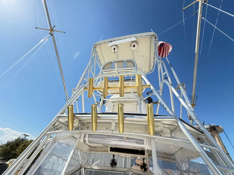 Slide: The Image of 2001 Albemarle 280 Express Sport Fisherman boat with tower against clear blue sky. - 18