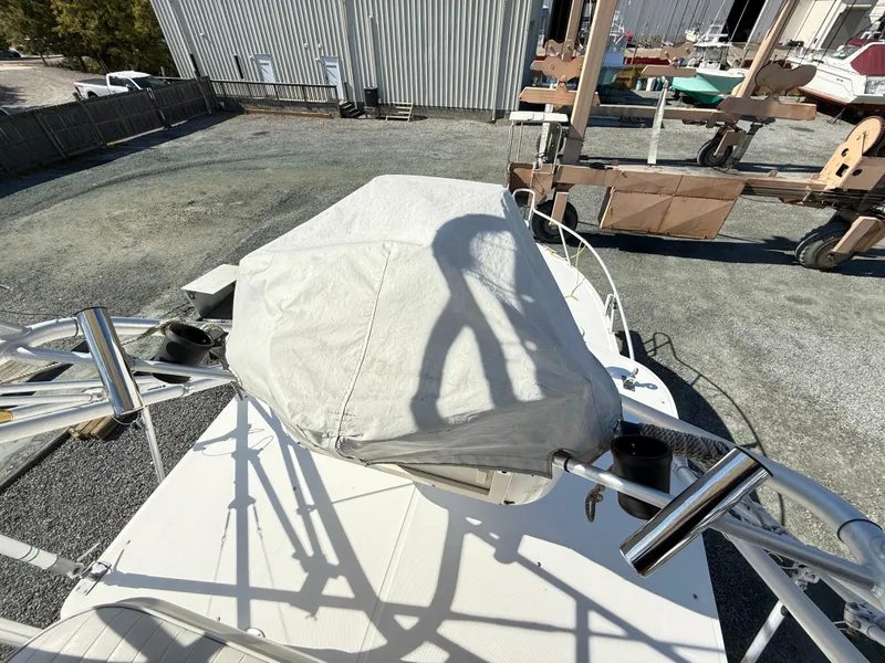 Slide: The Image of 2001 Albemarle 280 Express Sport Fisherman boat with covered equipment on deck. - 22