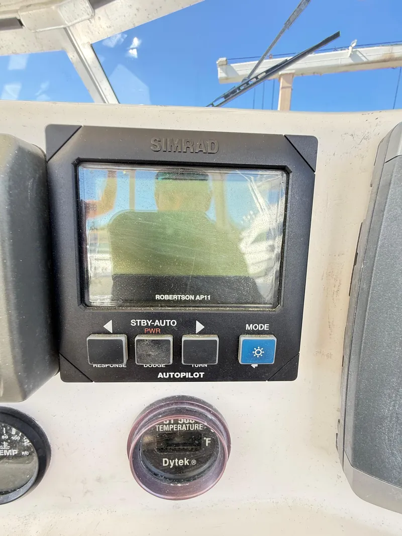 Slide: The Image of Simrad autopilot display on 2001 Albemarle 280 Express Sport Fisherman boat. - 31