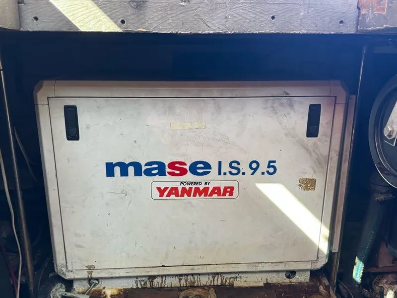 Slide: The Image of Mase I.S. 9.5 generator powered by Yanmar in 1985 Egg Harbor 37 Convertible. - 30