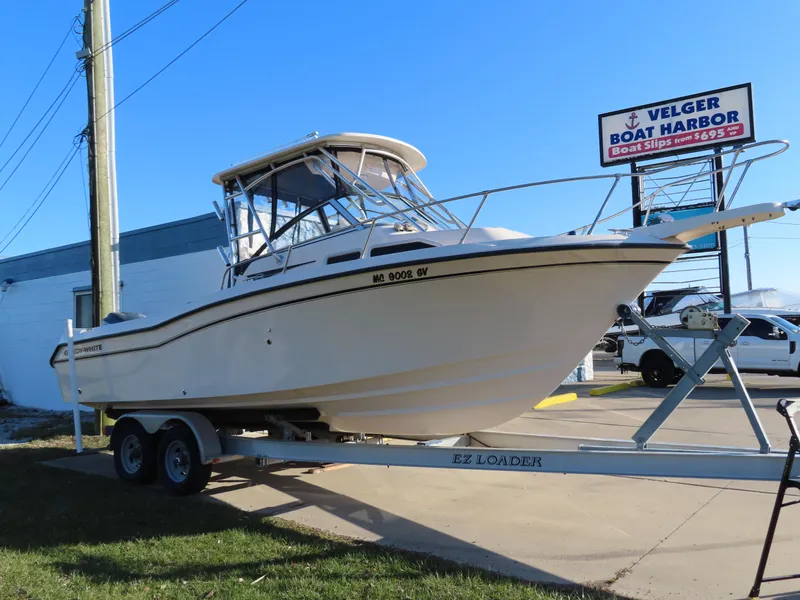 Slide: The Image of 2006 Grady-White Journey 258 boat on trailer at Velger Boat Harbor. - 3